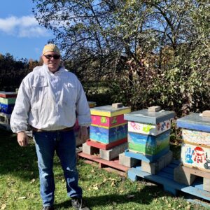 Beekeeper with Hives